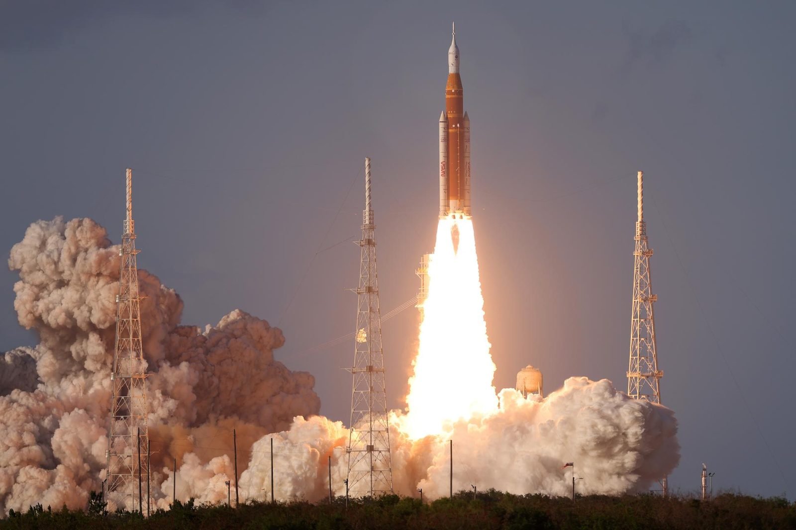 Artemis II liftoff — SLS and Orion leave Pad 39B.