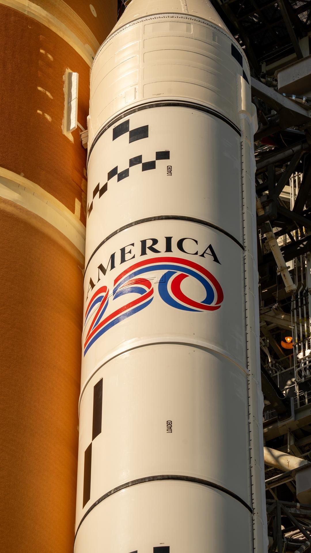 Artemis II SLS and Orion roll out of the Vehicle Assembly Building toward Pad 39B.